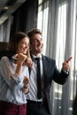 Couple or marriage in his new home looking through the window Royalty Free Stock Photo