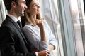 Couple or marriage in his new home looking through the window Royalty Free Stock Photo