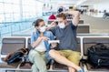 Couple with mask stuck in airport no able to return home country due to COVID-19 border closures