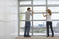 Couple Measuring Apartment Window Royalty Free Stock Photo