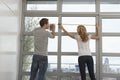 Couple Measuring Apartment Window Royalty Free Stock Photo