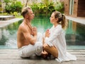 Couple meditate together in the morning