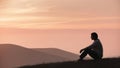 a Couple meditating together on a mountain top Royalty Free Stock Photo