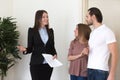 Couple meeting with estate agent, newly-built property for rent Royalty Free Stock Photo