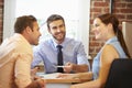 Couple Meeting With Financial Advisor In Office Royalty Free Stock Photo
