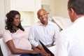 Couple Meeting With Obstetrician In Clinic Royalty Free Stock Photo