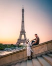 Couple men an woman honeymoon Paris Eiffel tower, couple men and woman city trip in Paris Royalty Free Stock Photo
