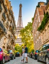 couple men an woman honeymoon Paris Eiffel tower, couple men and woman city trip in Paris Royalty Free Stock Photo