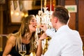 Happy couple in restaurant eat fast food Royalty Free Stock Photo