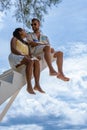 couple man and woman on stairway in the sky, Ladder Way to Heaven isolated on sky Royalty Free Stock Photo