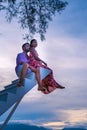 couple man and woman on stairway in the sky, Ladder Way to Heaven isolated on sky Royalty Free Stock Photo