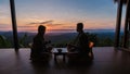 a couple of men and women on vacation in Northern Thailand staying at a homestay cabin hut