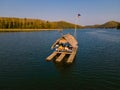 Couple at Huai Krathing lake in North Eastern Thailand Isaan , famous for its floating bamboo rafts Royalty Free Stock Photo