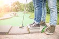 Couple at mini golf court