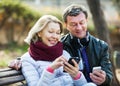 Couple with mobile phones Royalty Free Stock Photo