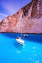 Couple of motor boats anchored on Navagio beach also known as shipwreck beach, Zakynthos island, Greece