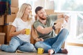 Couple moving new home. Happy people buy new apartment Royalty Free Stock Photo