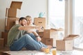 Couple moving new home. Happy people buy new apartment Royalty Free Stock Photo