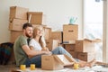 Couple moving new home. Happy people buy new apartment Royalty Free Stock Photo