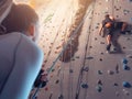 Couple mutual agreement. Support concept. Climbering in boulder gym. Royalty Free Stock Photo