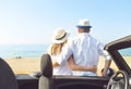 Couple near car on the beach Travel and vacation concept Royalty Free Stock Photo