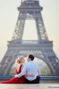 Couple near the Eiffel tower in Paris, France Royalty Free Stock Photo