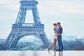 Couple near the Eiffel tower in Paris, France Royalty Free Stock Photo