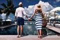 Couple near poolside Royalty Free Stock Photo