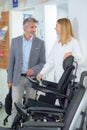 couple and new wheelchair model Royalty Free Stock Photo