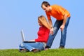 Couple with notebook Royalty Free Stock Photo