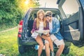 Couple on off road car looking at the map Royalty Free Stock Photo