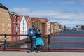 Couple on Old Town Bridge Trondheim Royalty Free Stock Photo