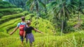 Couple om Tegalalang Rice Terrace Fields and some Palm Trees Around, Ubud, Bali, Indonesia Royalty Free Stock Photo