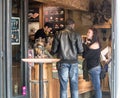 Couple orders gelato at Ile Saint-Louis shop in Paris, France