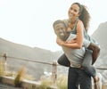 Couple outdoor, happy with piggyback and fitness, smile in portrait and interracial people train together. Mockup space Royalty Free Stock Photo