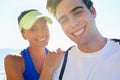 Couple, outdoor and portrait in beach front, exercise and fitness with smile, training and sunrise for run. Man, woman Royalty Free Stock Photo