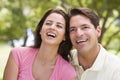 Couple outdoors smiling Royalty Free Stock Photo