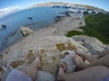 Couple overlooking Mykonos from rocks