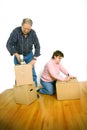 Couple packing boxes