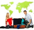 Couple packing suitcase for a journey Royalty Free Stock Photo