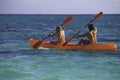 Couple paddling their kayak Royalty Free Stock Photo