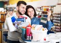 Couple in paint supplies store Royalty Free Stock Photo