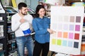 Couple in paint supplies store Royalty Free Stock Photo