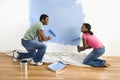 Couple painting wall. Royalty Free Stock Photo