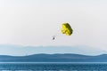 A couple parasailing at sunset in Adriatic sea coast