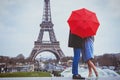 Couple in Paris, honeymoon vacation in France, Europe, man and woman kissing near Eiffel tower Royalty Free Stock Photo