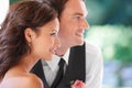 Couple, partnership and together on wedding day at outdoor ceremony, smile and happy for marriage. People, profile and