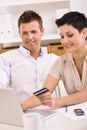 Couple paying with credit card Royalty Free Stock Photo