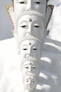 Couple peaceful white buddha statues sitting well alignment and decorating wonderful attractive mirror