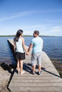 Couple people tourist with happy and relax time on pontoon Royalty Free Stock Photo